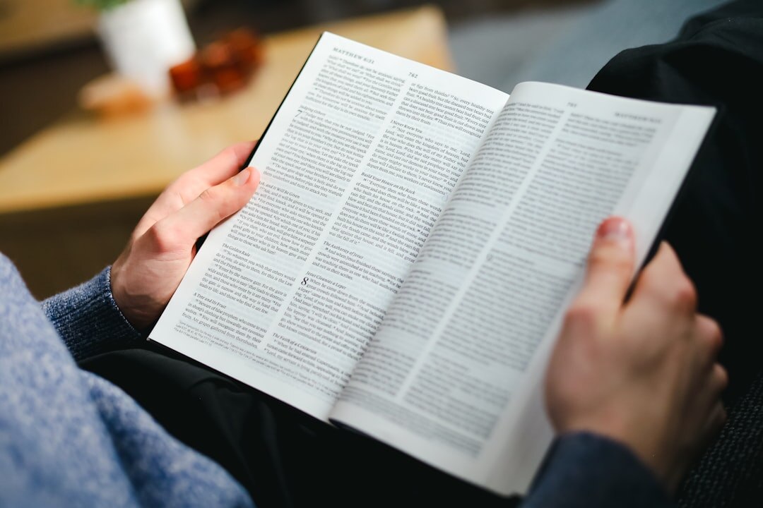 person reading mystery book
