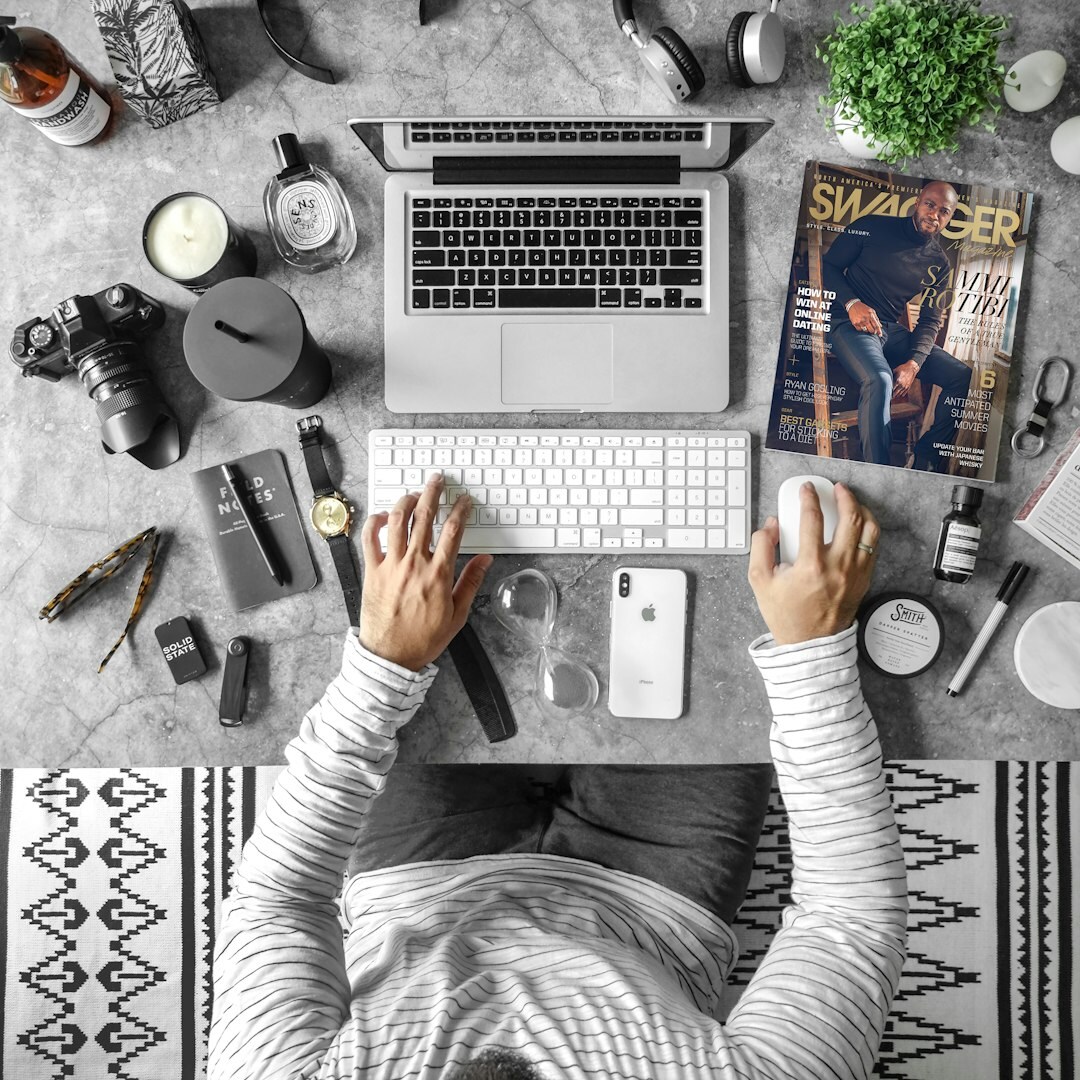 Croatian mystery writer sitting at a wooden desk in a dim study