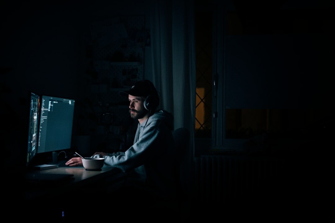 writer typing at night